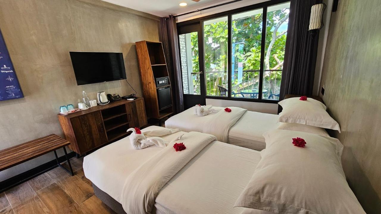 Dhigurah Cottage Bagian luar foto